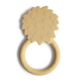 Teething ring with textured top and circular base on a white background