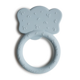 Blue teething ring with a bow design on a white background