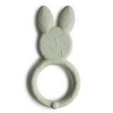 Green bunny-shaped teething ring on a white background