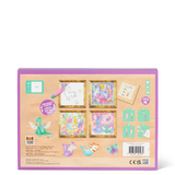 Children's craft kit packaging with illustrations and tools on a beige background
