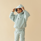 Child wearing WILSON & FRENCHY Sage Organic Terry Sweat Pant & matching hoodie
