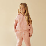 Studio shot of girl wearing WILSON & FRENCHY Pretty Pink Organic Quilted Jacket and matching pant