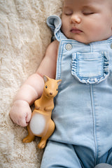 Baby sleeping with TIKIRI Rubber Kangaroo Australian Animal