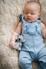 Baby sleeping with TIKIRI Rubber Koala Australian Animal