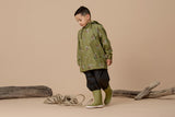 Studio shot of child wearing CRYWOLF Play Jacket - Catapult and matching fern rainboots