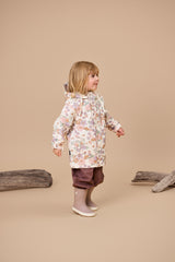 Side shot of child wearing CRYWOLF Play Jacket - Daisy Floral