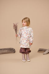 Studio shot of child wearing CRYWOLF Play Jacket - Daisy Floral