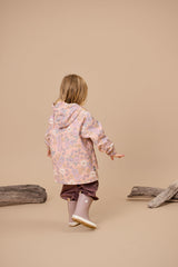 Back view of child wearing CRYWOLF Explorer Jacket - Daisy Floral and Mauve Rain boots