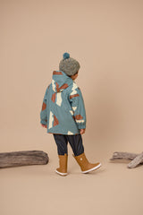 Back view of child wearing CRYWOLF Explorer Jacket - Move Mountains - blue jacket with brown and white mountain print