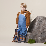 Child wearing CRYWOLF Rain Overalls Southern Blue - studio shot