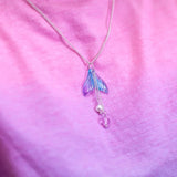 Child wearing LAUREN HINKLEY Mermaid's Tail Necklace