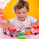 Child playing with MAKE ME ICONIC Australian Vehicles