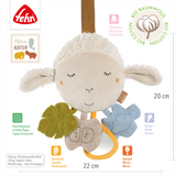 Children's toy sheep with crinkly paper, mirror, and rattle on a white background