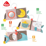 Children's soft book with various textures and shapes on a white background, featuring the brand 'fehn'.