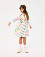 Girl twirling in the ROCK YOUR BABY COLOUR POP LONG SLEEVE DRESS