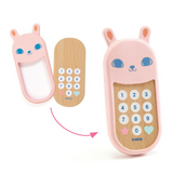 Toy phone with rabbit design and detachable keypad on a white background