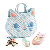 Cat-shaped handbag with a phone, key, and watch on a white background