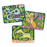 Three colorful animal-themed coasters with a snake, leopard, and tiger on a green background.