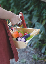 Girl holding the DJECO Wild Wood Foraging Trug (Basket)