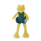 Plush toy frog wearing green overalls on a white background