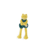 Plush frog toy with hands clasped wearing green overalls on a white background