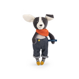 Black & white soft toy dog wearing jeans, red scarf and yellow boots.