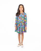 Studio shot of girl wearing ROCK YOUR BABY NORDIC FLORAL LONG SLEEVE WAISTED DRESS