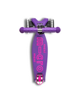 Purple scooter with 'maxi micro' branding on a white background