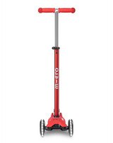 Red scooter with Micro branding on post and LED wheels