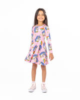 Girl wearing ROCK YOUR BABY UNICORN DAISY LONG SLEEVE WAISTED DRESS