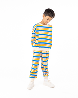 Studio shot of boy wearing ROCK YOUR BABY VINTAGE STRIPE SWEATSHIRT and matching trackpants