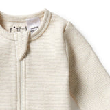 Detail view of neckline and zip opening cover