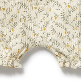 Bottom of Lemon leaf patterned fabric on a white background