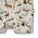 Bottom of baby romper with a jungle animal pattern on a white background