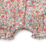 Floral patterned fabric with a white background