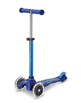Blue scooter with black accents on a white background