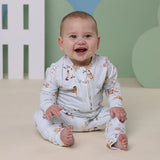 Baby sitting on floor dressed in SNUGGLE HUNNY Kittens Organic Snugglesuit Convertible Romper
