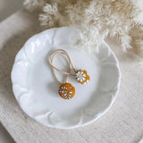 Josie-Joan_s-Rachel-Button-Ties-in--bowl-Juno-Boutique