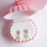 LAUREN HINKLEY Ocean Treasure Earrings: Purple in a pink velvet shell box