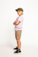 Side view of boy wearing MUNSTER KIDS Windswell Short - Sand