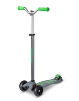 Children's scooter with green handlebars and deck on a white background