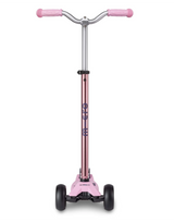 Pink scooter with rose gold frame on a white background