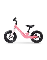 Pink balance bike with black wheels on a white background