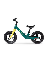 Green balance bike with yellow accents on a white background