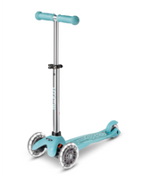 Aqua scooter with silver accents on a white background