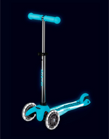 Aqua scooter with aqua handlebar on a dark background
