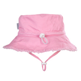 Back view of a pink bucket hat with frayed edges on a white background