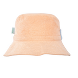 Bucket hat with a peach color gradient on a white background