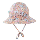Back view of Floral patterned bucket hat on a white background showing head and neck ties