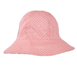 Pink bucket hat with white polka dots on a white background
